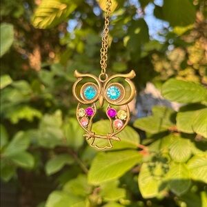 NWT Brass metal owl and several colored gemstones on a brass chain. Very sturdy.